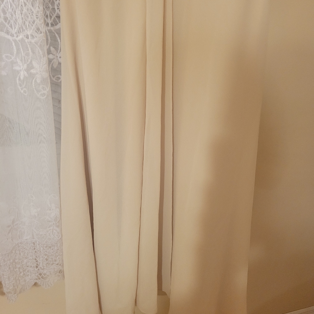 Cream dress with beaded top comes with a little camisole